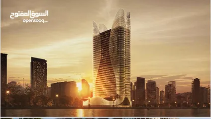  1 تملك شقتك بمنطقه الخليج التجارى بدبى .متاح جميع الخدمات .لوكيشن مميز جدا .تصميم معمارى متميز جدا.