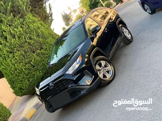  1 تيوتا رافور هايبرد 2023 xle لون اسود ملوكي جمرك اليوم اعلى صنف