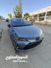  15 تويوتا كورولا 2021 هايبرد بحاله الوكاله