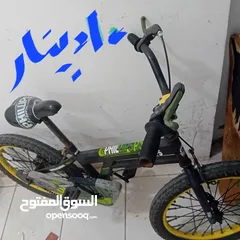  1 دراجة هوائية وعربانة اطفال
