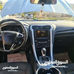  7 فورد فيوجن 2014 هايبرد كلين فحص كامل لون سلفر بحالة الوكالة