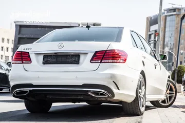  26 Mercedes E200 2016  Avantgarde Amg kit  السيارة وارد الشركة