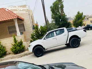  13 ميتسوبيشي L200 2011