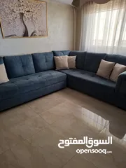  2 كنب زاويه حرف ل بلون تركواز انيق يتحول الى سرير كبير تصميم عملي وعصري بحاله شبه جديد للبيع بالمدينه