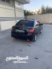  9 كيا برايد فتحة سقف بنزين 1600اوتماتيك