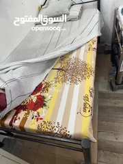  2 Single iron bed with mattress and pillow