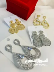  2 اكسسوارات للاذن بمضهر جميل ومفتن يزيد جمالك إلى ضعفه وايضا كفالة على الون