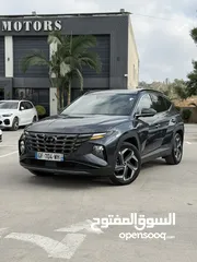  1 هونداي توسان ترخيص 2022 محرك 1600 هايبرد plug in/يقطع على الشحنه 65 كيلو متر