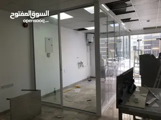  8 Aluminium room and partitions, glass window, door, kitchen cabinets