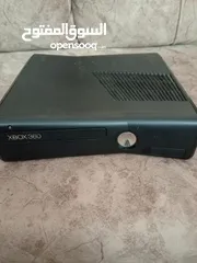  1 X Box 360 مستعملة 5يدات 3سود و2بيض و14سيدي  وشاحنين وبطريتين
