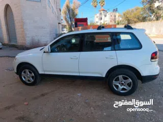  5 فولكس فاجن طوارق 2008 بحالة الوكالة  ماتور ديزل 3000 V6 عداد 145000 جير و ماتور و شصيات 100% وعلى ال