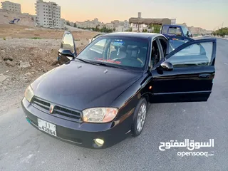  3 كيا سبكترى 2001للبيع المستعجل تومتك 2جيد خلفي ودقات امامي ماتور جديد دهان جديد ترخيص جديد مكينك جديد