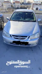  1 كيا سيراتو 2006 لون فضي