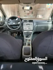  5 سيارة فورد فوكس صنع 2009 وستراد 2012 سيارة جيرعادي اصل اقتصادية بل بنزين فيها تامين وترخيص لشهر 9