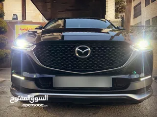  8 Mazda CX30 كهربائية بالكامل بوضع الزيرو 2021