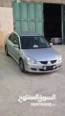  1 متسوبيشي لانسر مشطوب السعر 3300 رنتيس رام الله