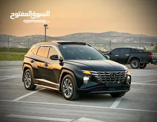  5 هونداي توسان/2022 فل الفل فتحة سقف بانوراما  2x4 ///240Hp بنزين + كهرباء  ( Haybrid) 1600cc