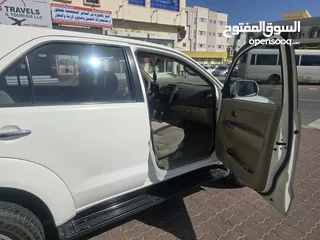  13 Toyota Fortuner 2011, white colour