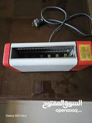  2 توستر لتحميص التوست وطاولة تلفزيون خشب ثقيل