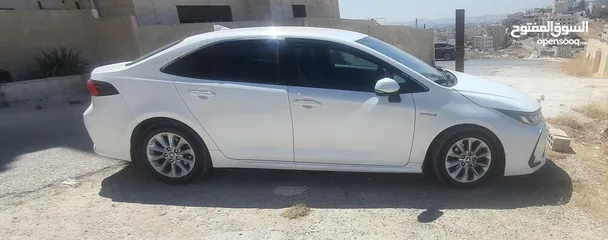  4 تويوتا كورولا 2021 هايبرد  للبيع مواصفات أوروبية سبعة جيد