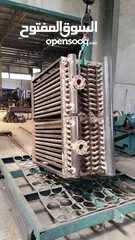  11 بويلرات بخار وتنكات ومداخن