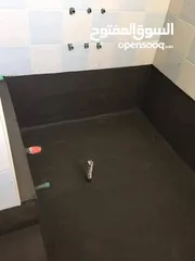  12 فني عازل مائي وحراري