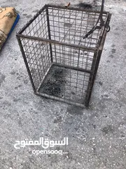  1 ‏قفص  ‏مكينة قهوة