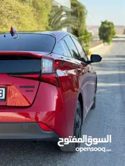  8 تويوتا بريوس برسونا 2021 لون احمر مميز جمرك جديد