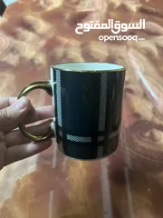  2 كوب (مج) اخضر الون يده ذهبية وجميل جدا ثقيل الحجم