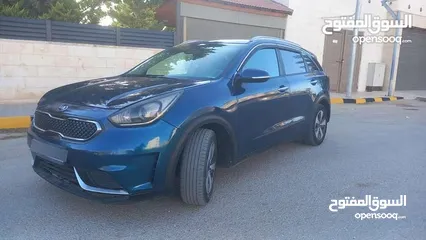  16 كيا نيرو لون كحلي فحص 2 جيد بسعر مغري قابل للبدل
