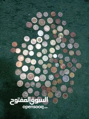  2 عملات معدنية وورقية