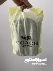  1 شنتة coach first copy  جلد باللون الأسود  للبيع