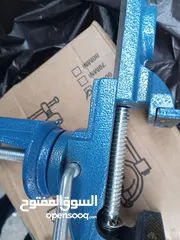  9 ملزمه شد و تثبيت  وضغط الادوات  او الصاق القطع الخشبيه او حمل حديد او خلوي  او صيانة   ملزمة