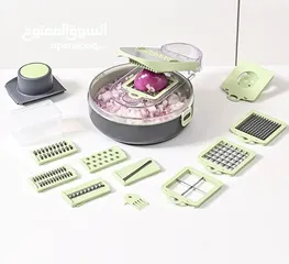  5 قطاعة الخضروات اليدوية 9 في 1 تحتوي على مجموعة من الشفرات لتقطيع الخضروات