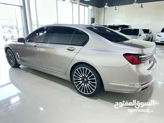  5 بي ام دبليو  750Li XDrive ذهبي داخل زعفراني خليجي