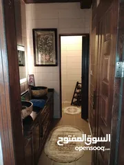  8 شقة طابقيه ارضيه مع تسويه للبيع في ابو نصير
