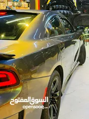  15 جارجر sxt  لون فيلي رقم بغداد باسمي