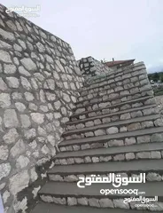  22 بناء سناسل حجريه واستصلاح الاراضي وتشييك المزارع وسلاسل حجريه بناء الشاليهات والبيوت الريفيه
