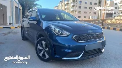  17 كيا نيرو لون كحلي فحص 2 جيد بسعر مغري قابل للبدل