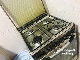  4 refrigerator , washing machine and cooking range with oven.