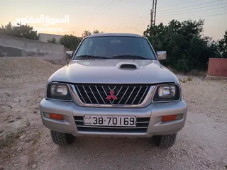  2 متسوبيشي l200 2004