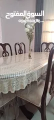  1 طاوله سفره مع 8 كراسي خشب زان لون عسلي غامق