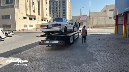  8 سطحة مدينة حمد 24  Hamad Town TOWING CAR 24  ونش  رافعة  رافعه  نقل  سطحة البحرين خدمات  سحب  سيارات