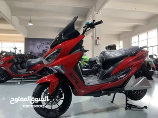  7 electric scooter red color fast speed 130kmh , with long range