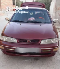  1 كيا سيفيا لون خمري مالك واحد من الحره فحص كامل اربعه جيد
