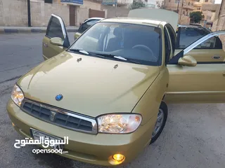  11 كيا سبكتر توماتيك اقساط دفعة 1200 دهان جديد  ماتور جديد  قير جيد  فحص مرفق  مكانيك سيارة مشية ناعمة