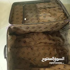  8 شنتة سفر جر لون بنفسجي غامق حجم كبير