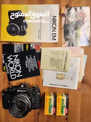  1 كاميرا فيلم Nikon EM