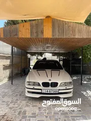  1 Bmw520 موديل 1997محدثة 2003 فل ماعدا الفتحة  فيها شاشة وجلد سقفية الكنتارا وكاريون فايبر من الداخل م