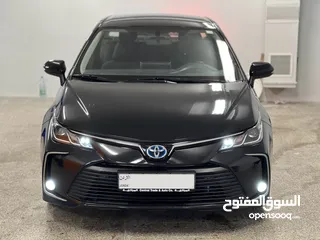  1 Toyota Corolla Hybrid 2019 ممشى قليل بحالة الوكالة